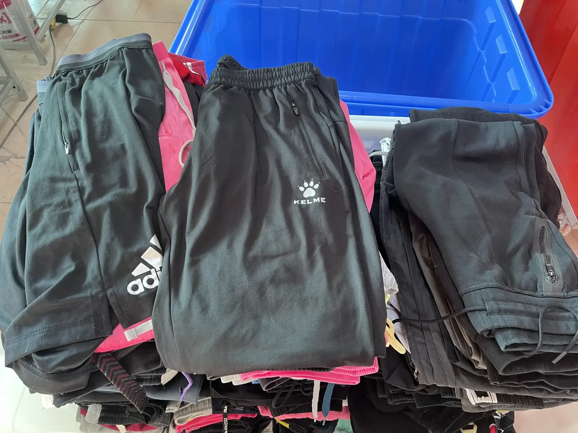 RealismThrift Wholesale Used Brand Clothes - High-Quality A-Grade Bulk Inventory from China Sorting Facility